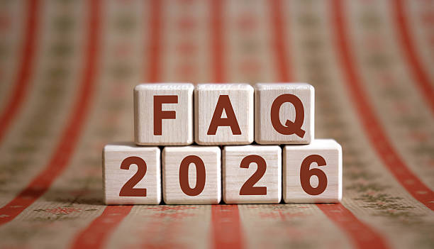 Wooden blocks displaying FAQ 2026 for chicken vaccination schedule questions