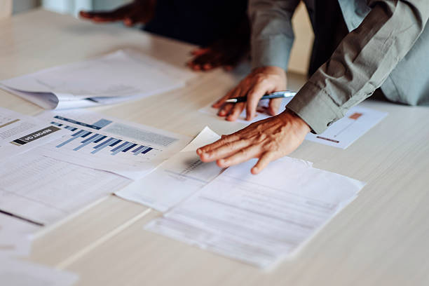 People reviewing paperwork for different types of animal quarantine certificates