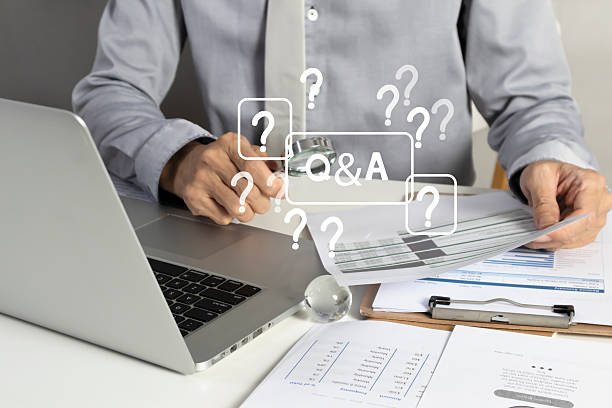Businessperson reviewing documents with export quarantine question symbols