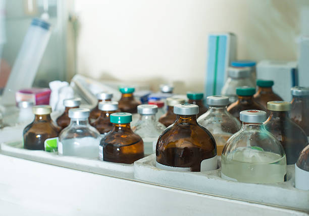 Veterinary medicine bottles stored in a medication storage area
